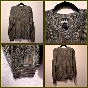 NWOT. J.W.E Designs sweater. Excellent condition.